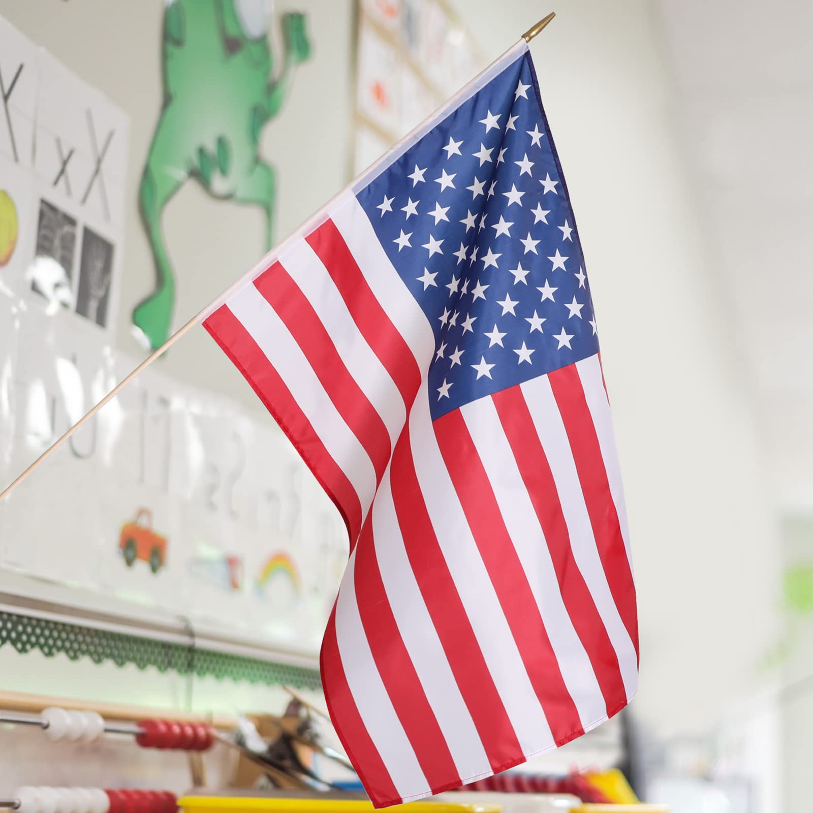 Newwiee scale comparison showing flag size relative to student desk for context