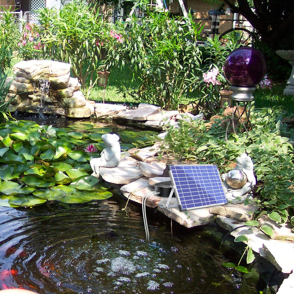 NFESOLAR in a garden pond lifestyle scene offering quiet, eco-friendly aeration