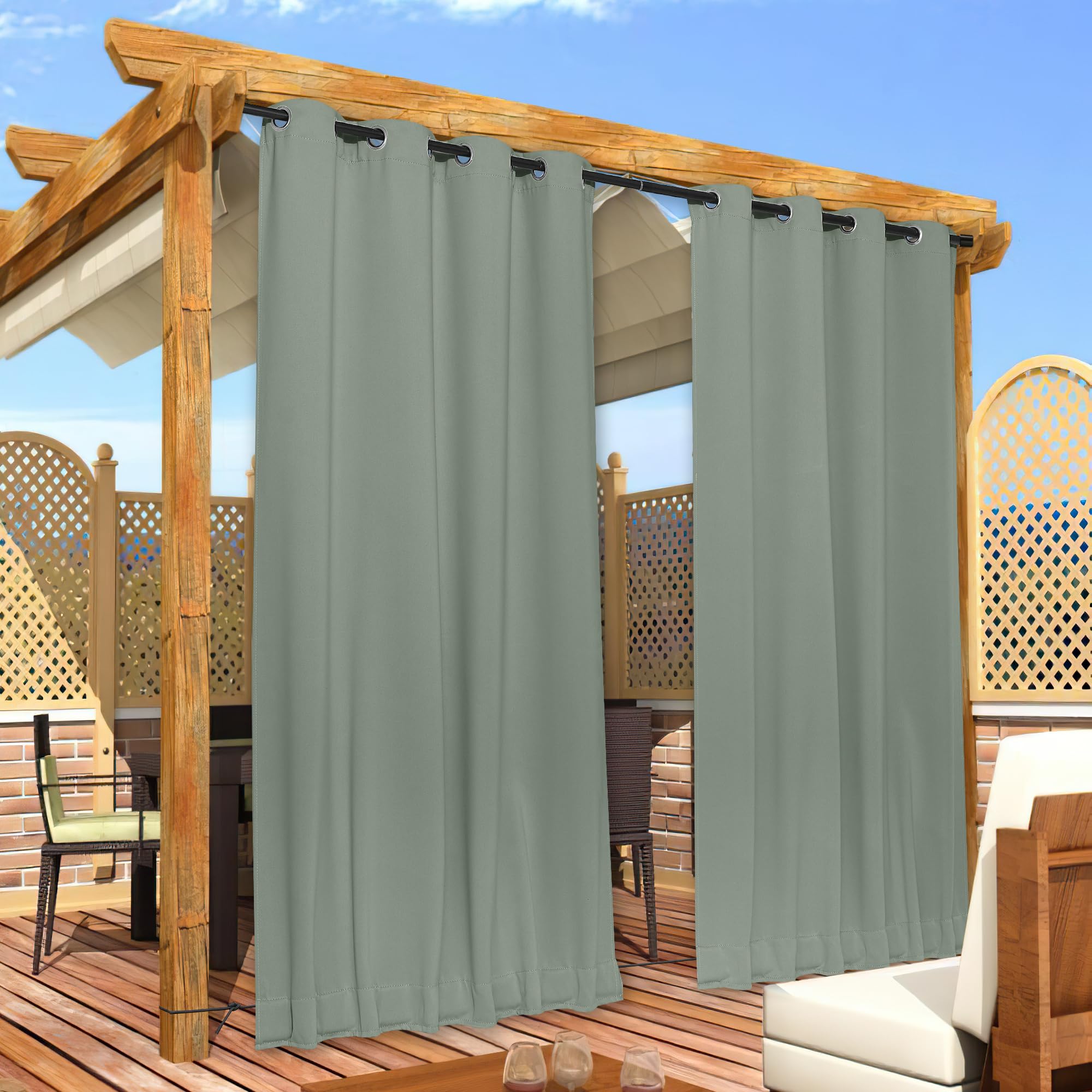 NICETOWN curtain next to chair showing scale and coverage benefit for patios
