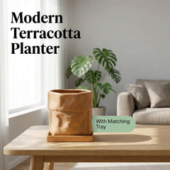 Nihow square saucer under pot showing snug fit, protects surfaces from runoff