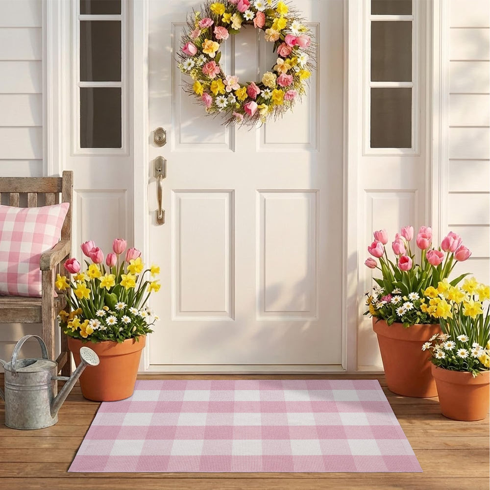 NIIKOOS front view of pink and white plaid rug showing welcoming color and pattern