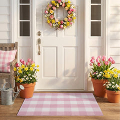 NIIKOOS front view of pink and white plaid rug showing welcoming color and pattern
