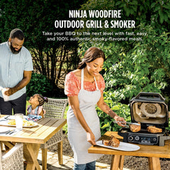 Ninja Woodfire Pro open grate with seared steaks showing strong char and grill marks