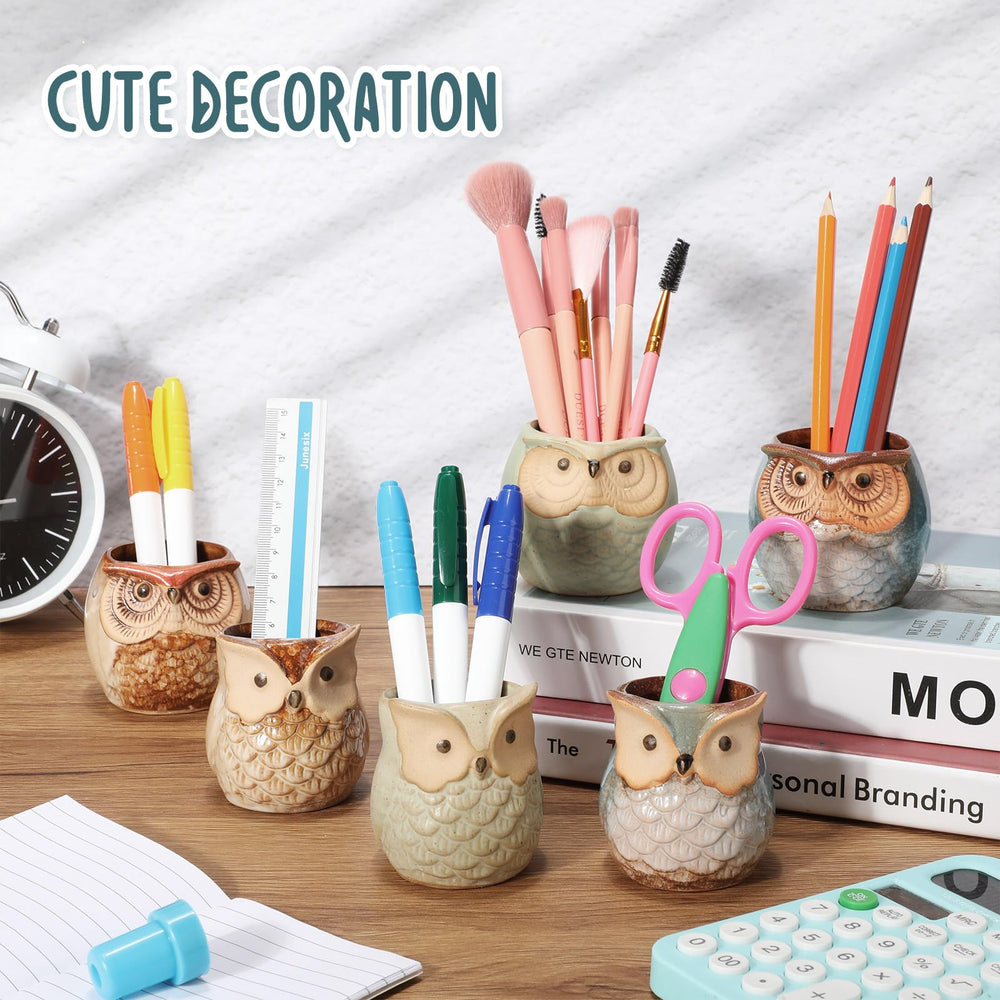 Nitial owl pots as table decor creating playful atmosphere for gifts and events