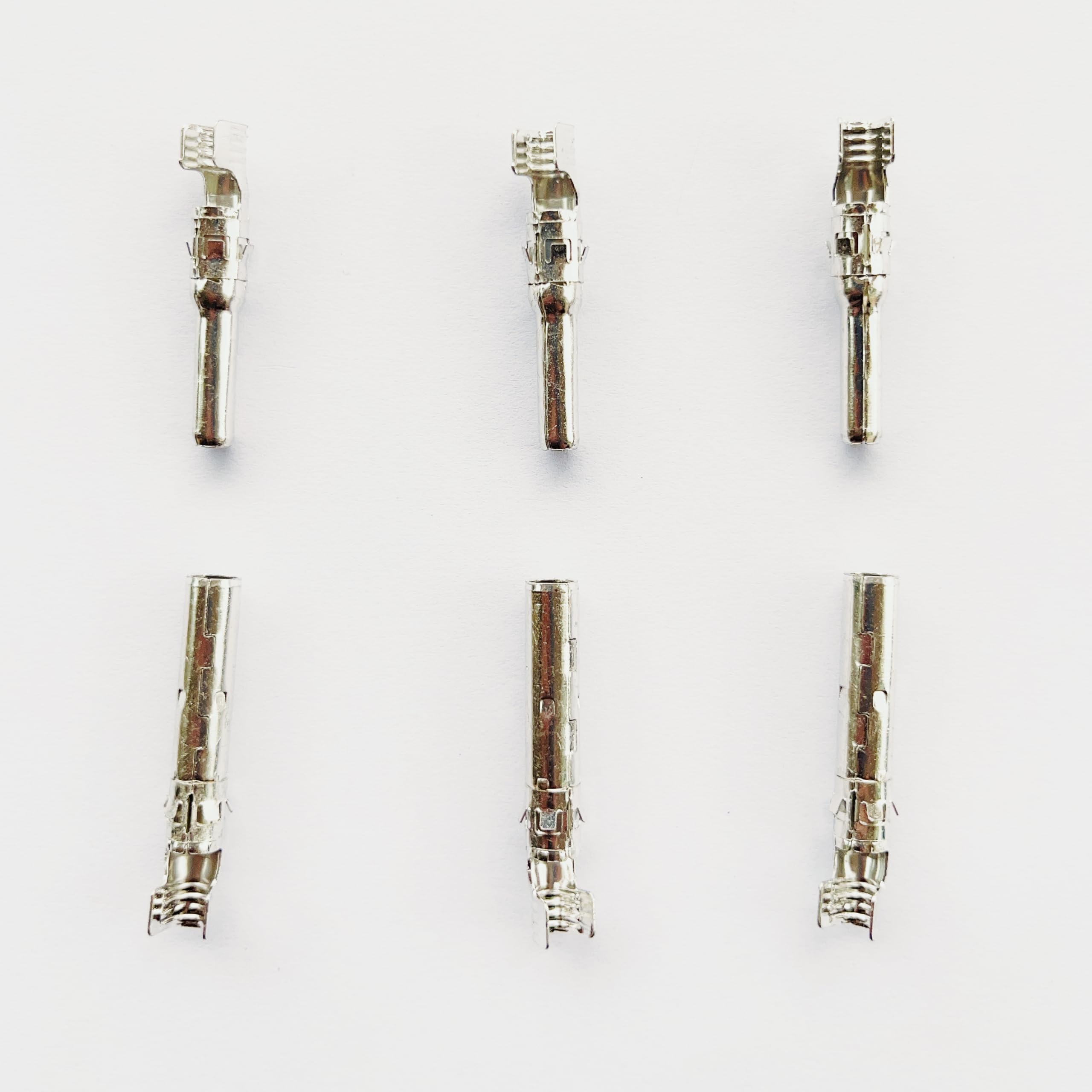Nixesky connectors held in hand to show scale and ease of handling during install
