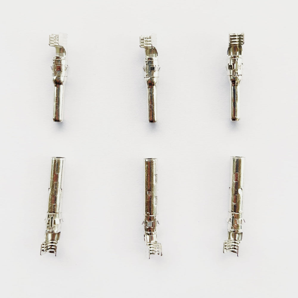 Nixesky connectors held in hand to show scale and ease of handling during install
