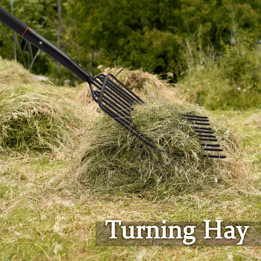 Nohovu pitchfork beside wheelbarrow for scale, moves larger volume per lift