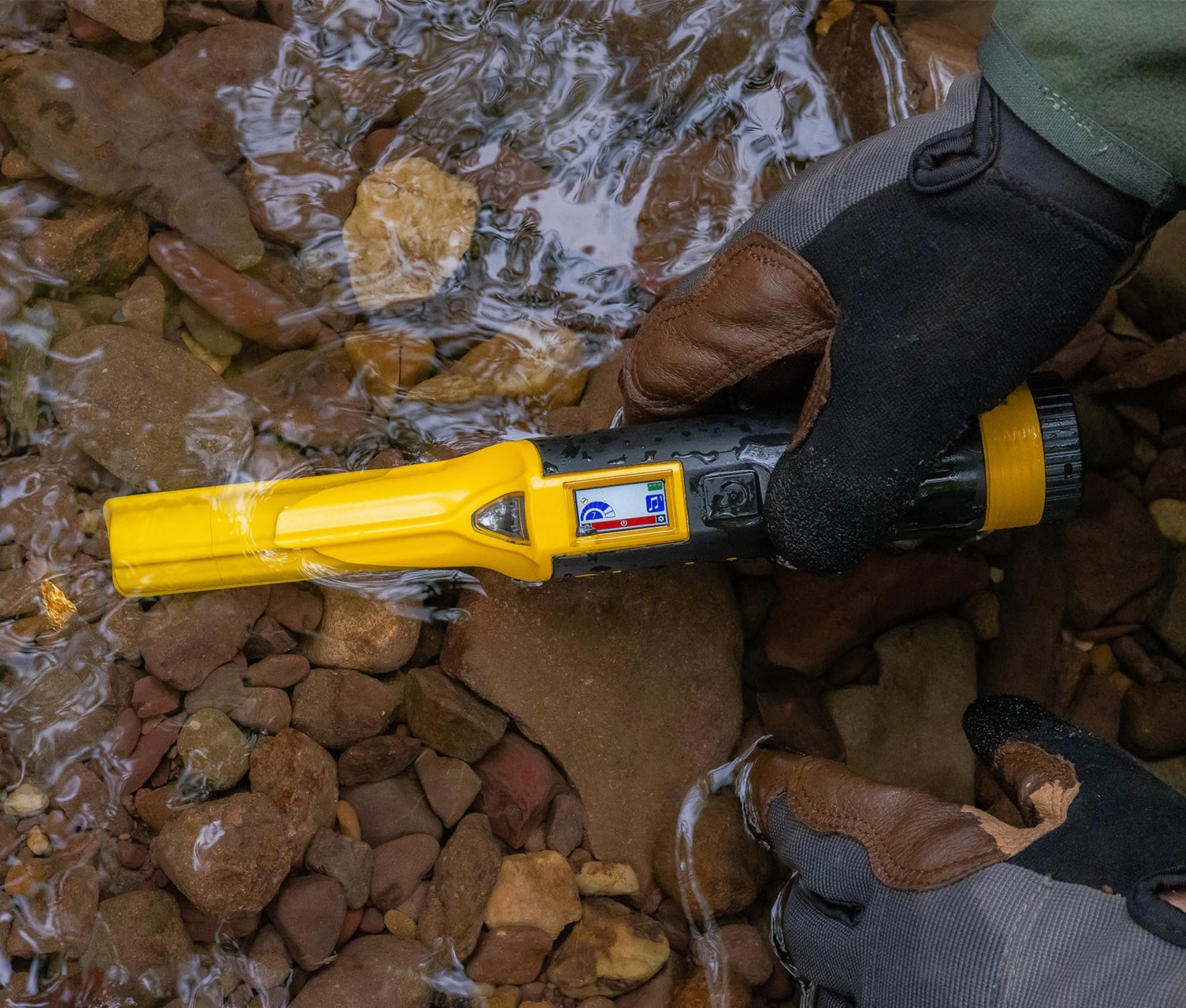 NOKTA AccuPOINT held in hand showing compact size and ergonomic grip for comfortable use