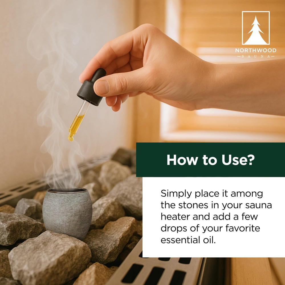 Northwood Sauna cup positioned among heater stones in a sauna, disperses aroma safely
