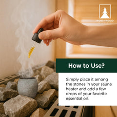 Northwood Sauna cup positioned among heater stones in a sauna, disperses aroma safely