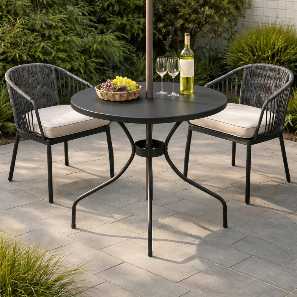 Novabright table staged with coffee and book illustrating convenience for outdoor relaxation