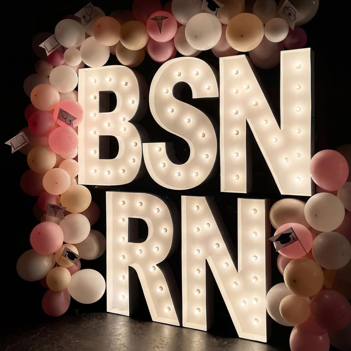 Nuanchu front view of BSN RN marquee letters showing bold illuminated display