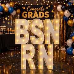 Nuanchu letters used as graduation photo backdrop adding warm atmosphere