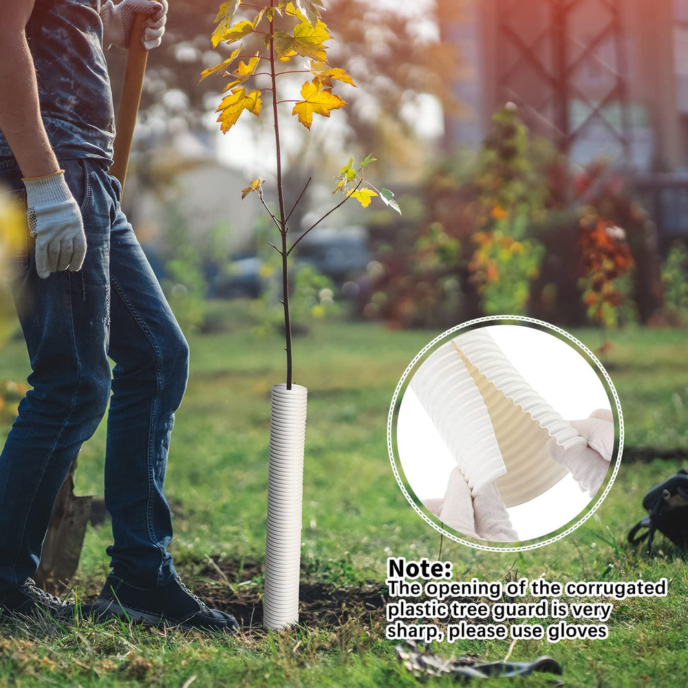 Nuenen tree guards used in a landscaped garden, protecting newly planted saplings