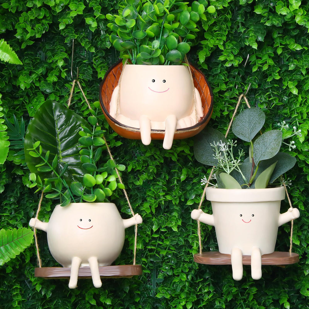 Nuogo front view of three hanging face planters showing style and hanging setup benefits