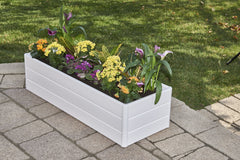 NuVue raised planter in use with herbs and vegetables demonstrating convenient elevated gardening