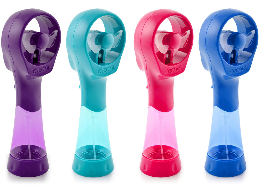 O2COOL fan beside sunglasses showing compact size for travel