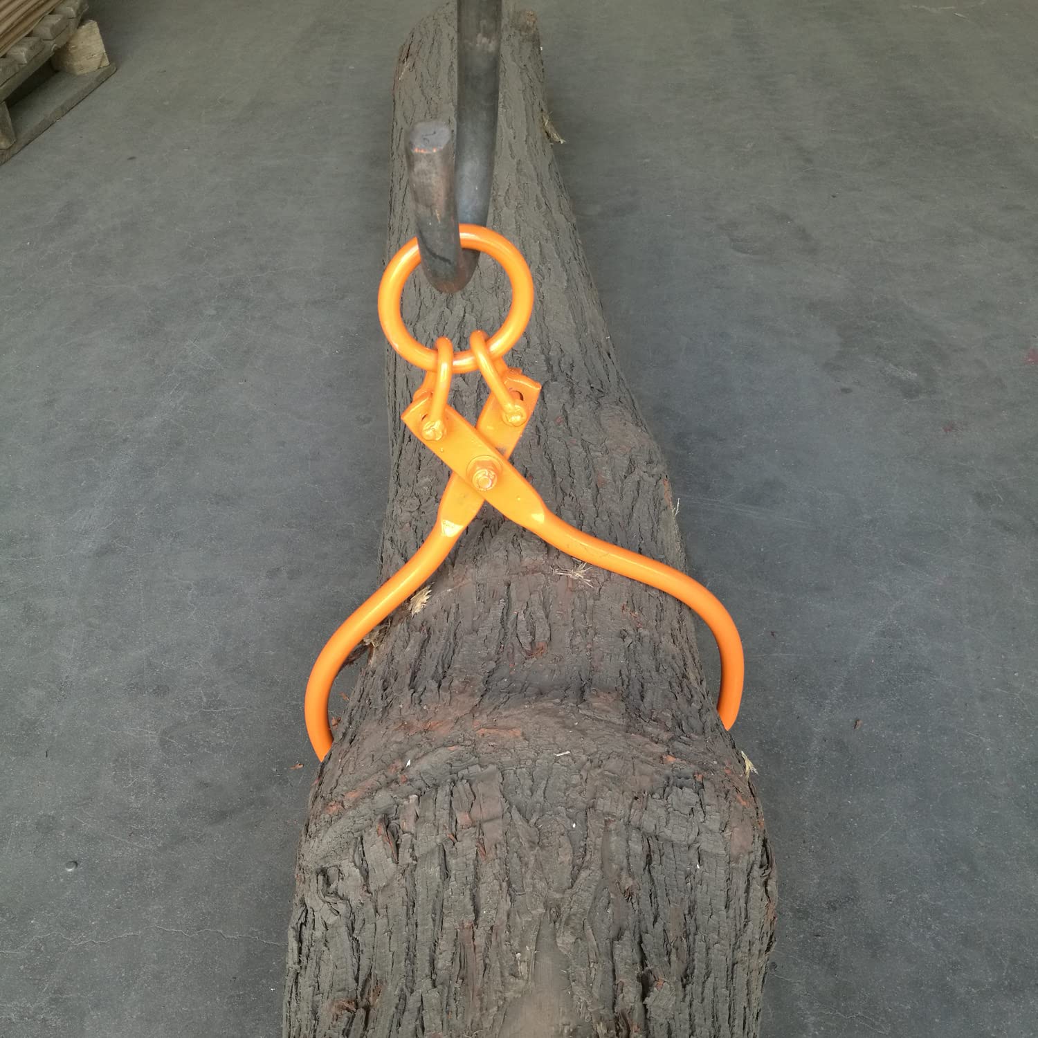 OAOLOWF tongs beside measuring tape showing 18 inch opening to match log diameters