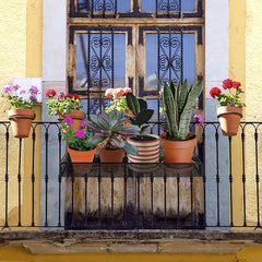 OBANGONG hanging planters on balcony rail freeing floor space and adding greenery