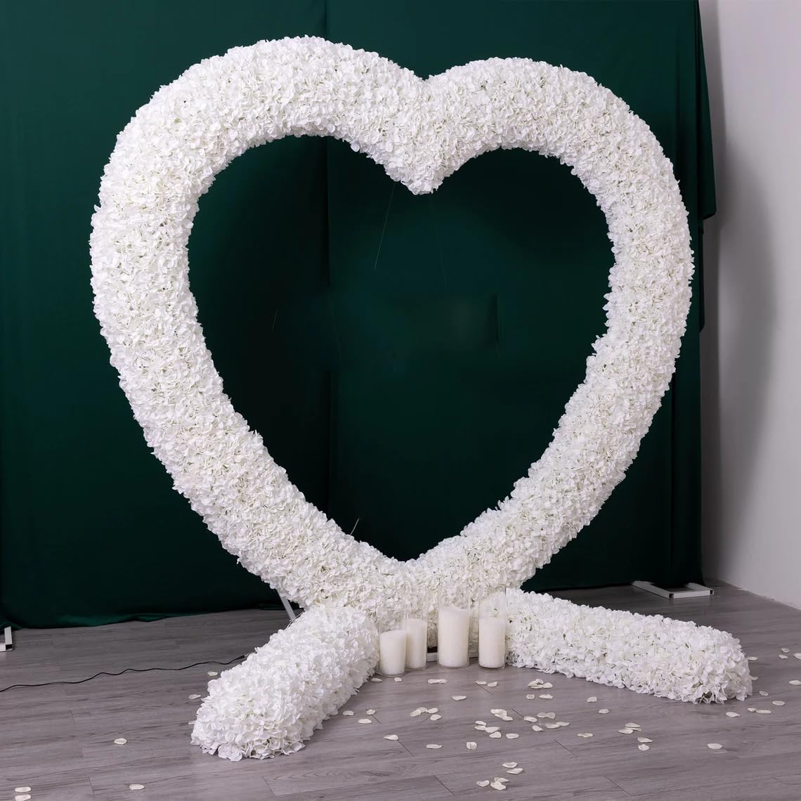 Oftest heart arch decorated with flowers demonstrating romantic floral styling benefit