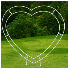 Oftest heart arch front view showing full white heart frame and elegant backdrop benefit