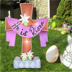 OILCUP front view of inflatable cross showing 'He is Risen' text and lilies, clear holiday focal point