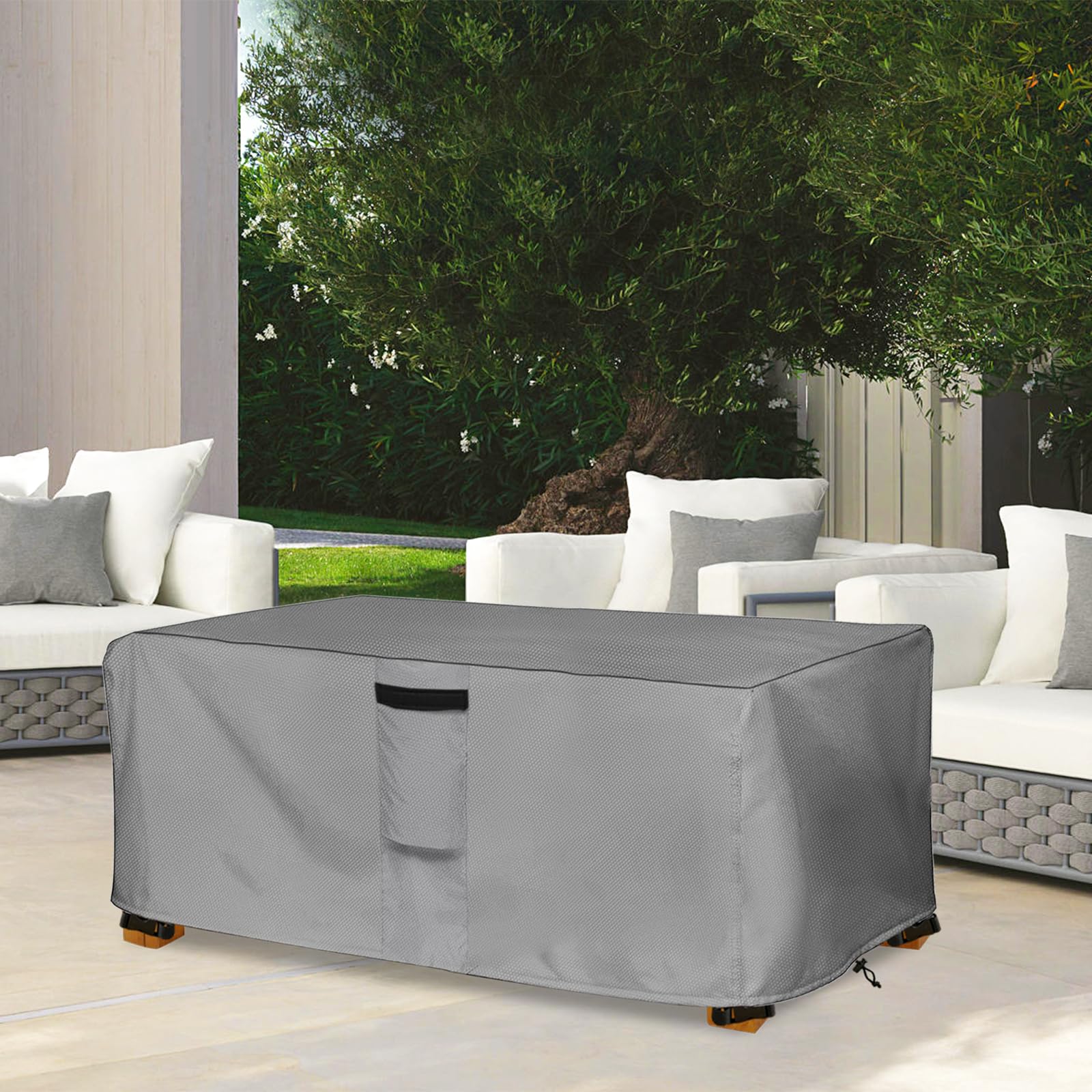 okcool lifestyle shot of covered patio coffee table, keeps furniture looking new