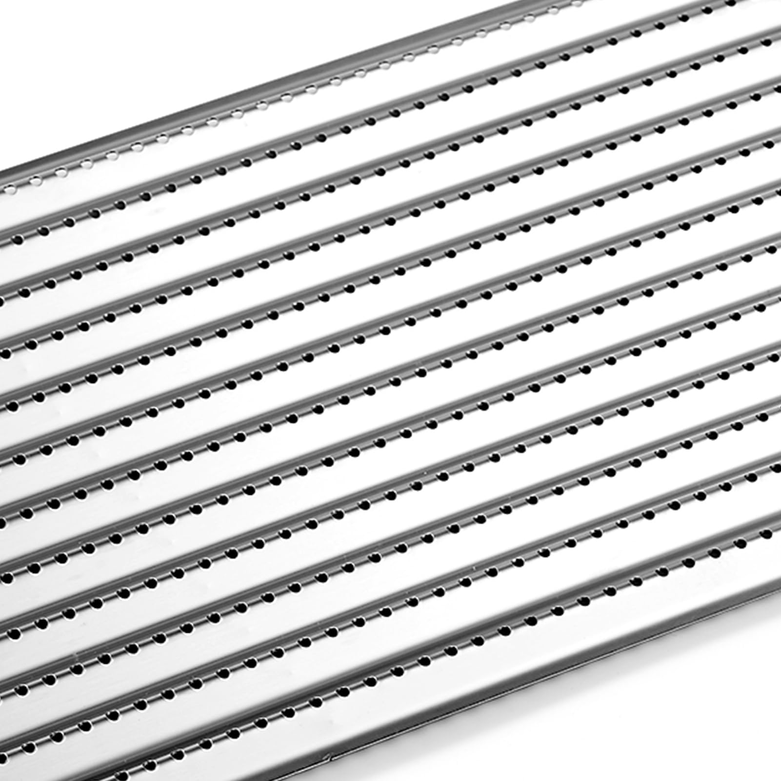 Oklagarden plates in grill with clear sear marks demonstrating improved results