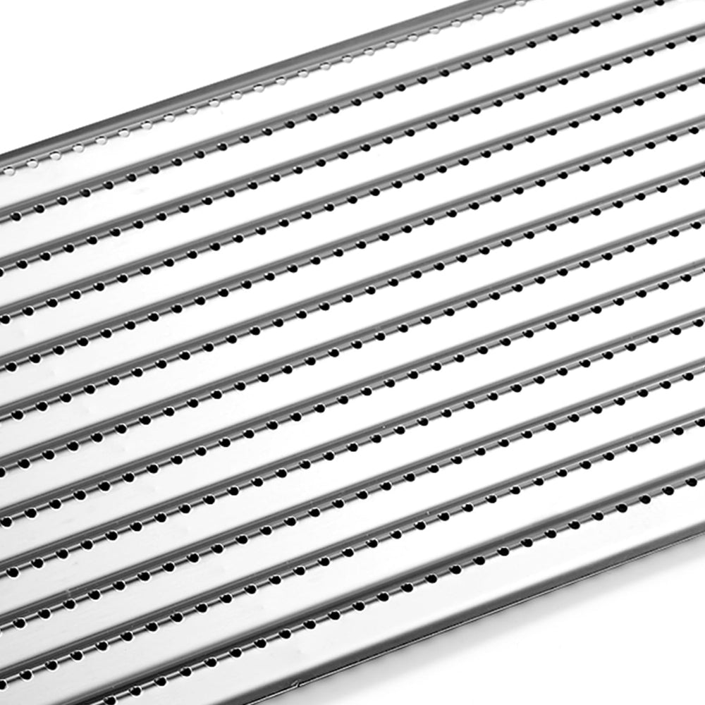 Oklagarden plates in grill with clear sear marks demonstrating improved results