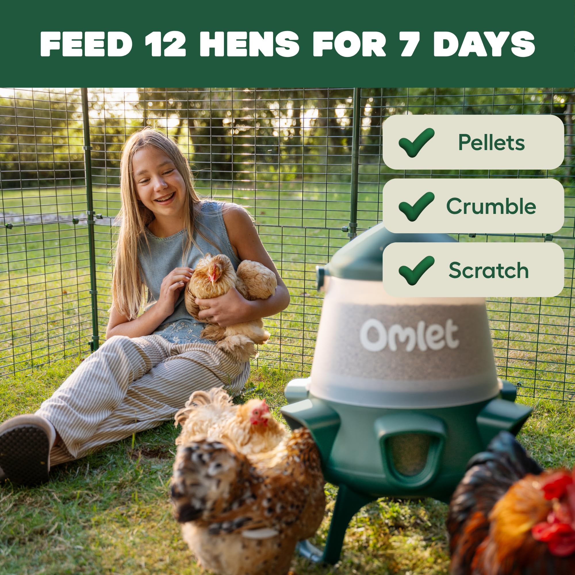 Omlet feeder hanging in a coop from a beam, saves floor space