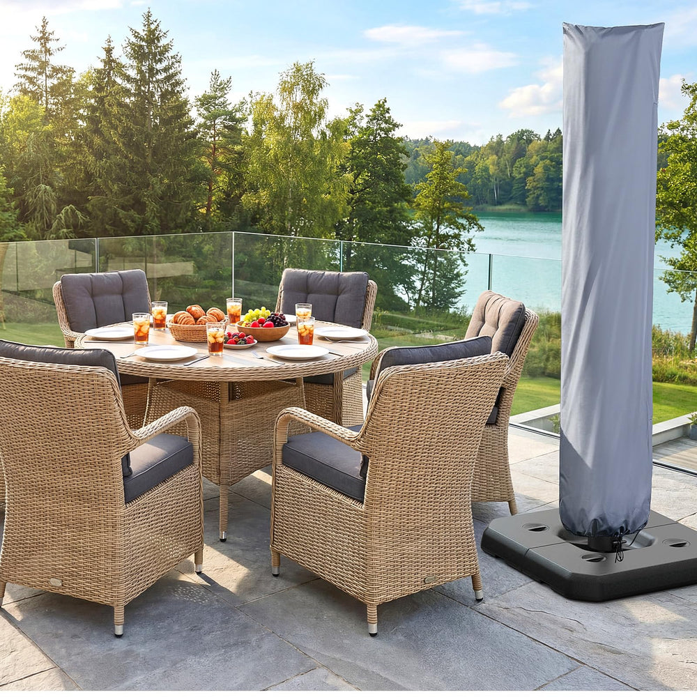 ONBRILL-covered patio umbrella in backyard setting offering season-long protection