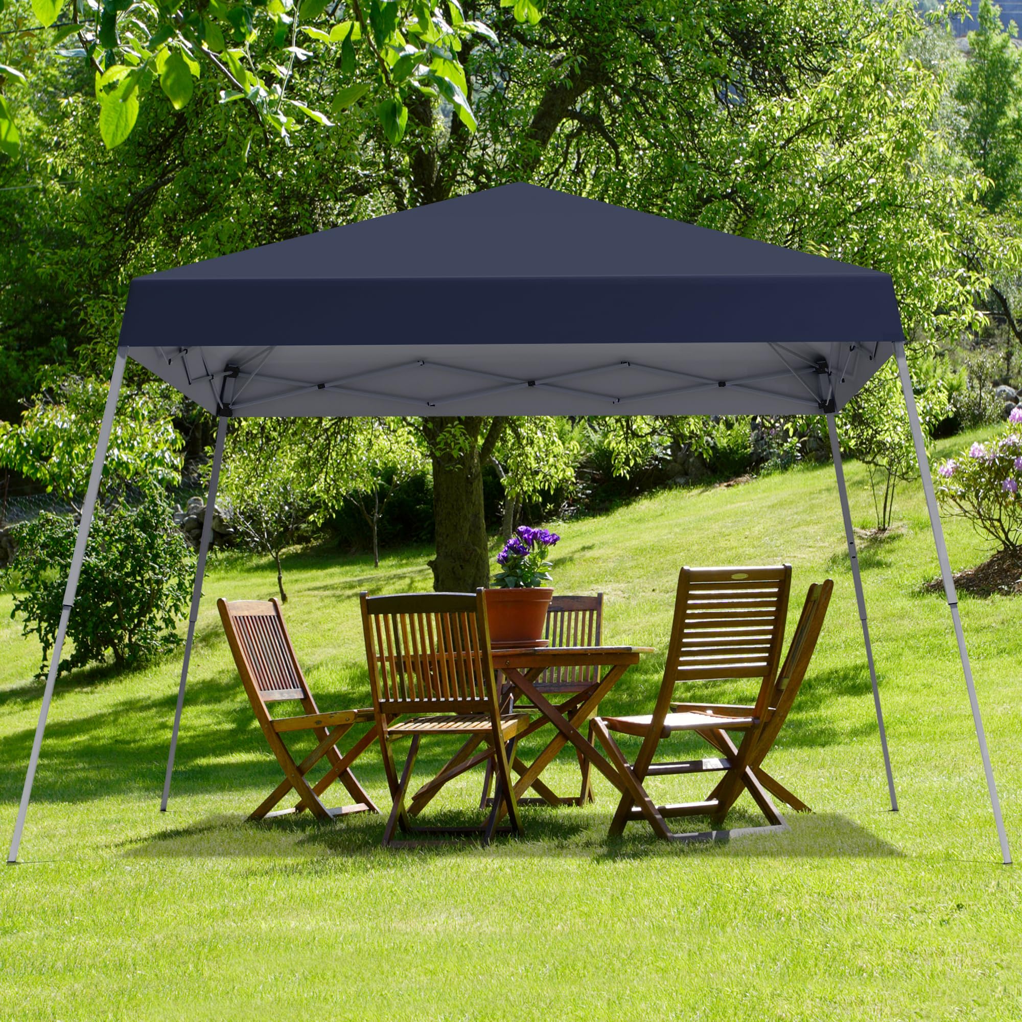 Oneofics included stakes and accessories displayed to secure canopy on grass or dirt