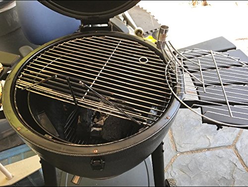 Onlyfire grate pivoted outward to access bottom grate showing easier fuel management