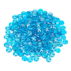 OnlyFire beads in a fire pit creating bright, reflective flames