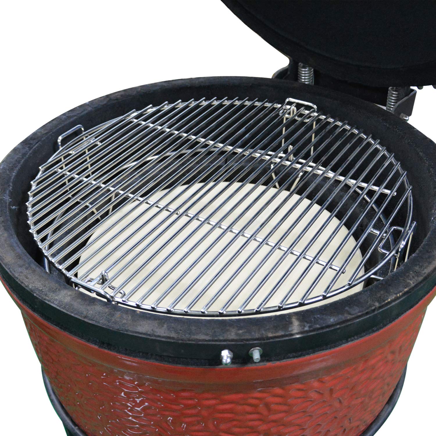 onlyfire grill in use with steaks, pizza, and vegetables showing multi-dish flexibility