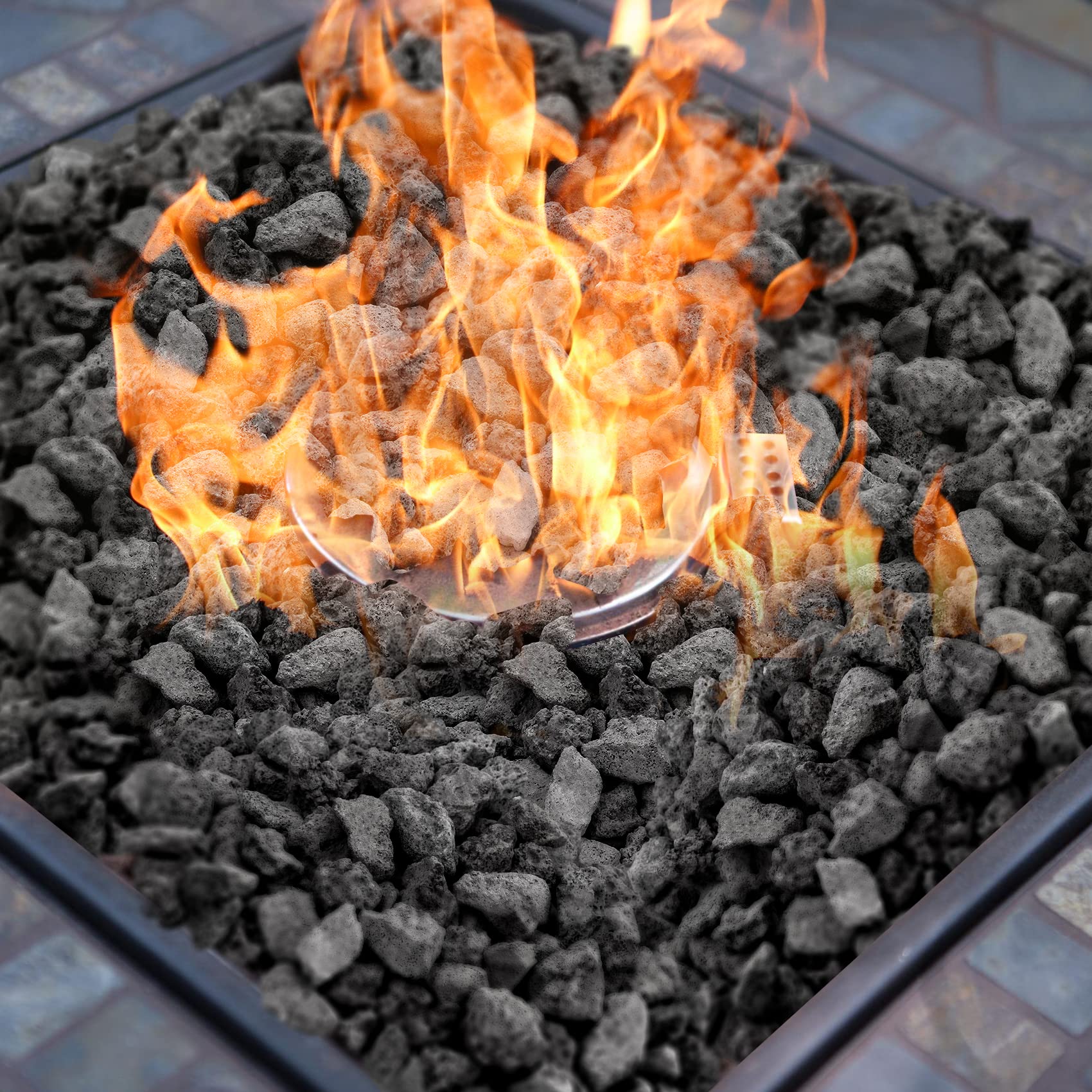 Onlyfire lava rock in a lit fire pit showing improved flame spread and visual effect