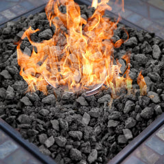 Onlyfire lava rock in a lit fire pit showing improved flame spread and visual effect