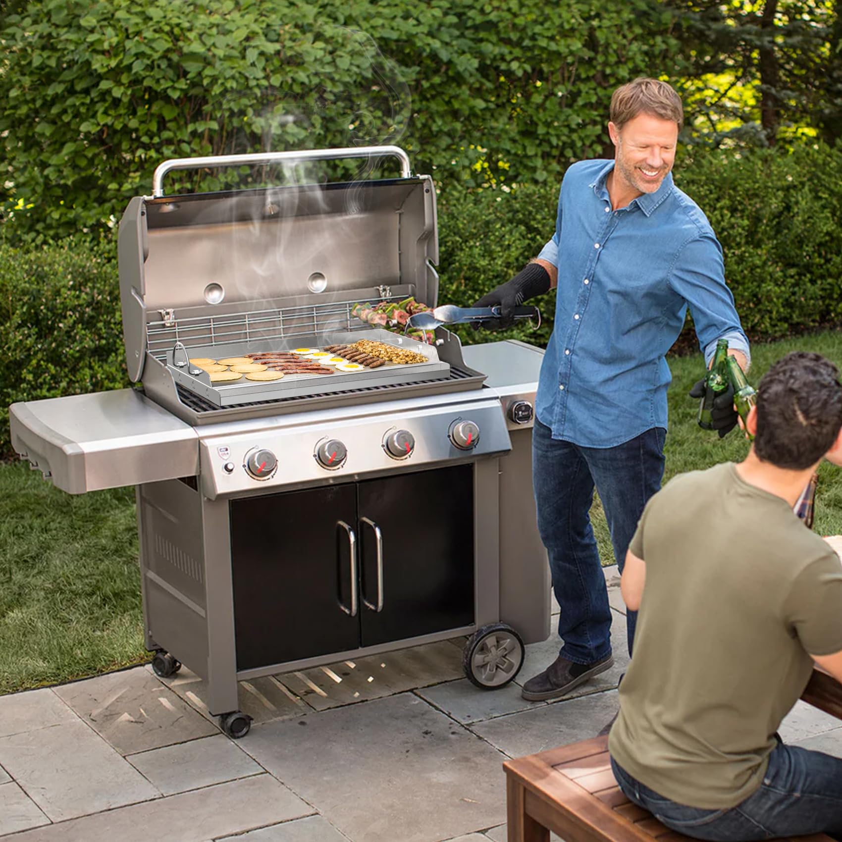 onlyfire in-grill fit demonstration resting on grates to convert grill into flat top