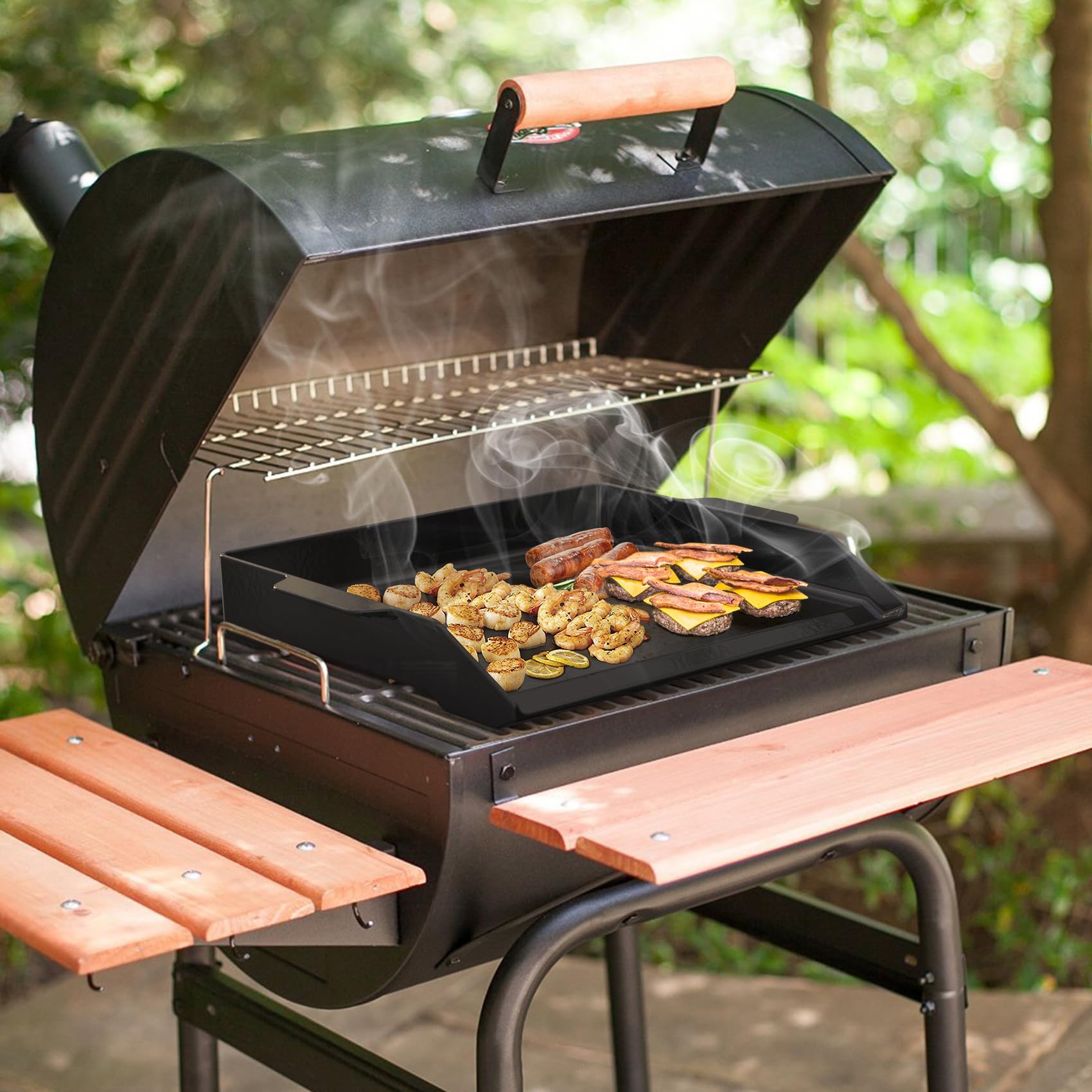 onlyfire griddle in use on outdoor grill cooking pancakes and burgers with even sear