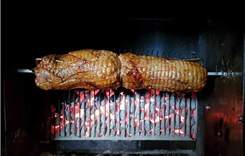 onlyfire lifestyle scene of backyard rotisserie roast showcasing even cooking