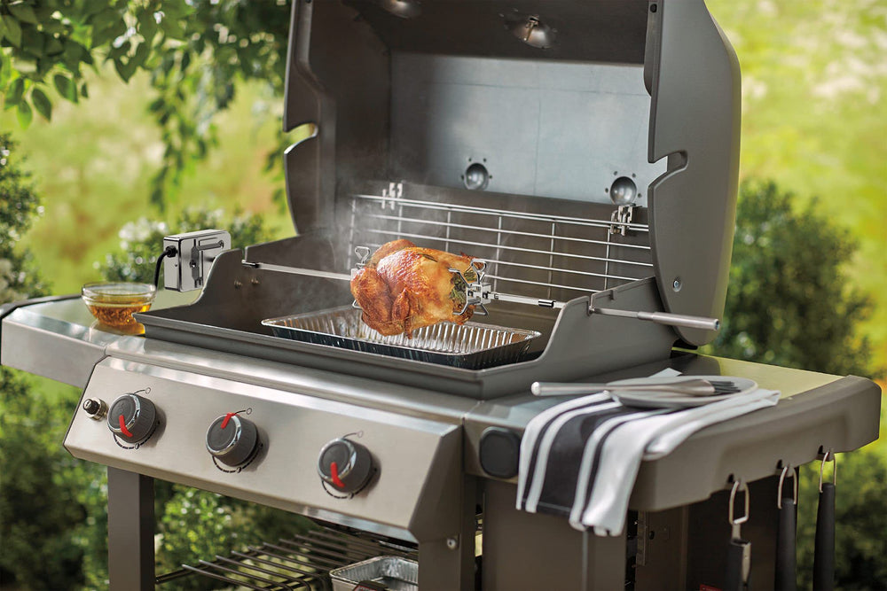 onlyfire rotisserie in use on a Weber Genesis grilling a golden roast