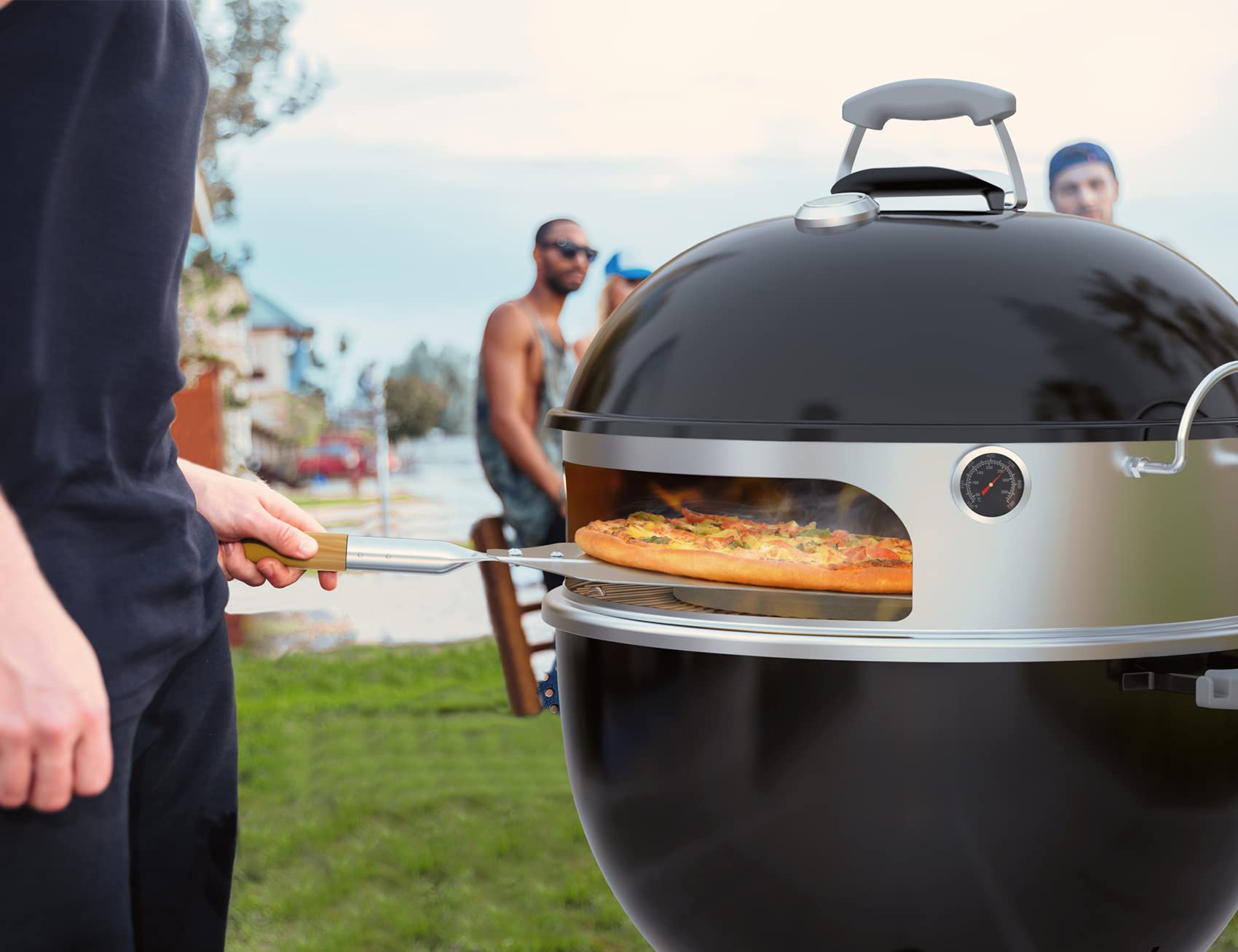 onlyfire peel loading pizza in grill for safe transfer and perfect crust benefit