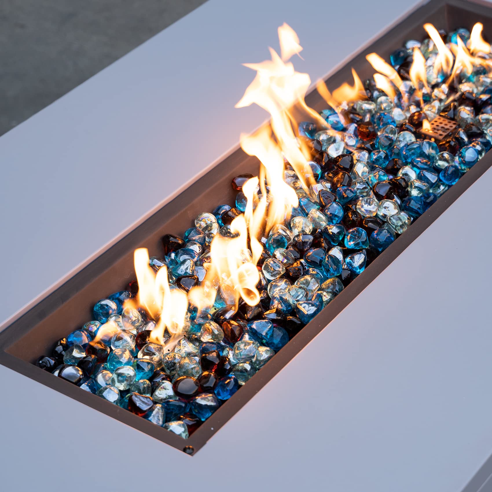 onlyfire placed at poolside illustrating resistant shine and design versatility