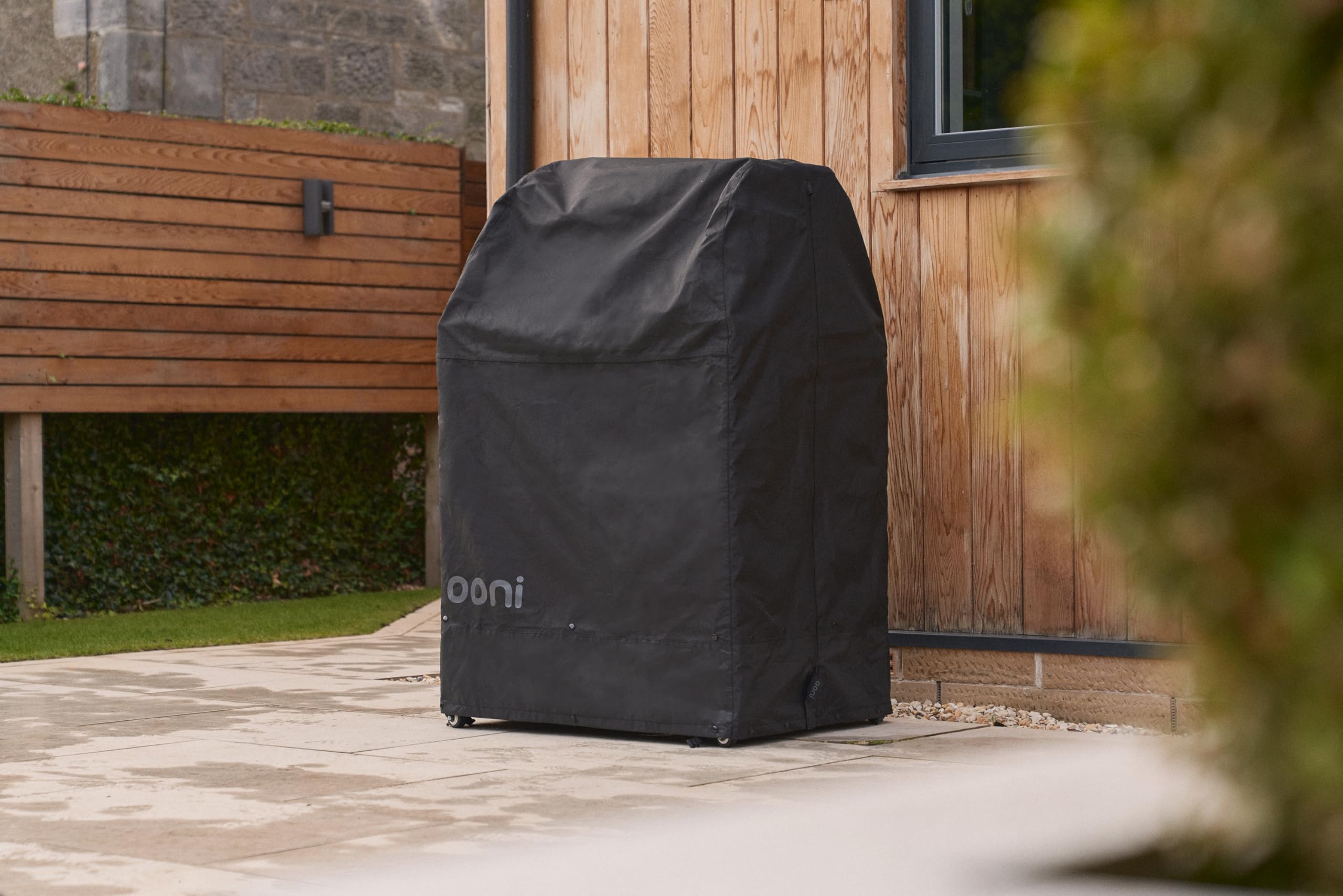 ooni covered oven on folding table demonstrating secure weather protection
