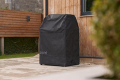ooni covered oven on folding table demonstrating secure weather protection