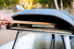 ooni pizza oven brush bristle closeup highlighting stainless steel bristles for thorough sweep