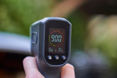 ooni thermometer laser pointed at baking stone to measure high oven heat accurately