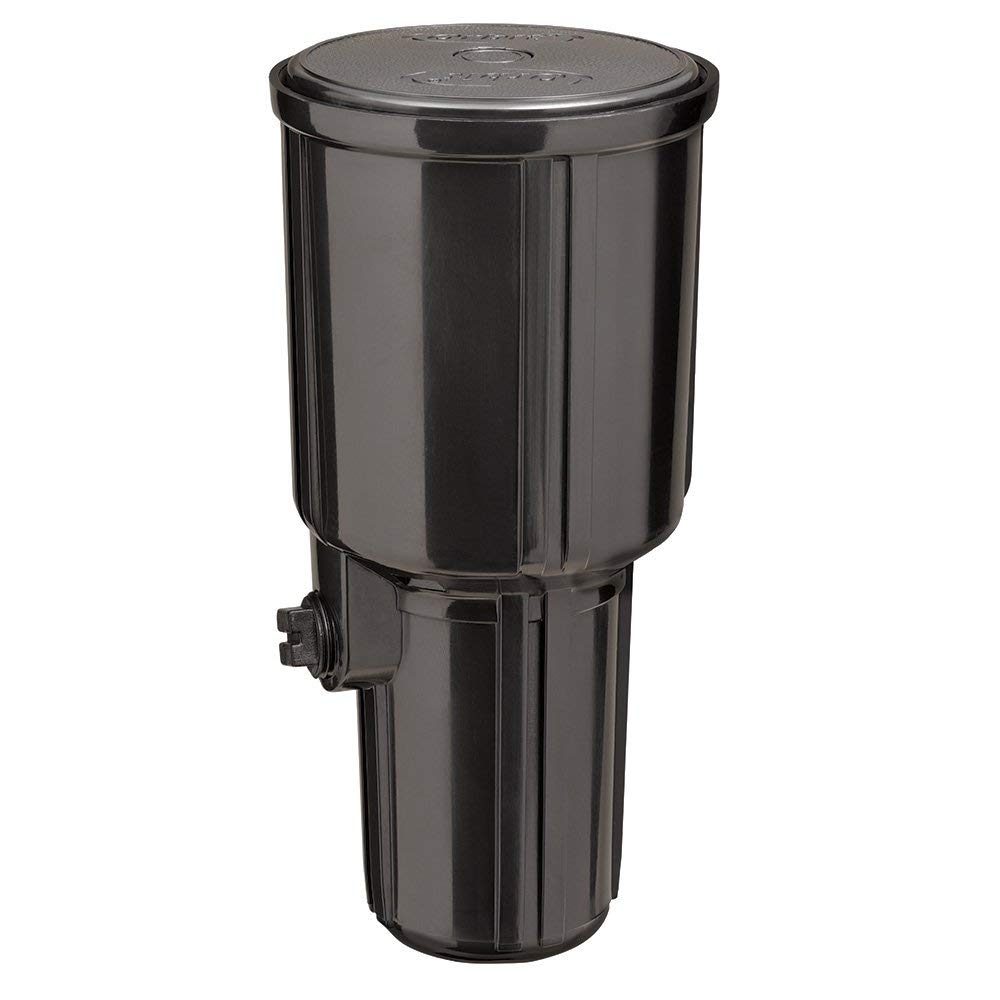 Orbit 55200 installed in lawn showing even 35-foot spray coverage benefit