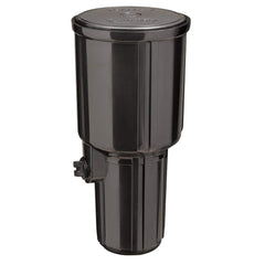 Orbit 55200 installed in lawn showing even 35-foot spray coverage benefit