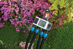 Orbit B-hyve XD four outlets close-up displaying separate ports for multi-zone control